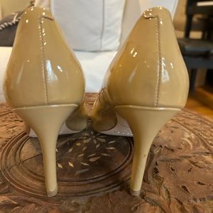 Beige patent leather pumps with 3.5 inch heel